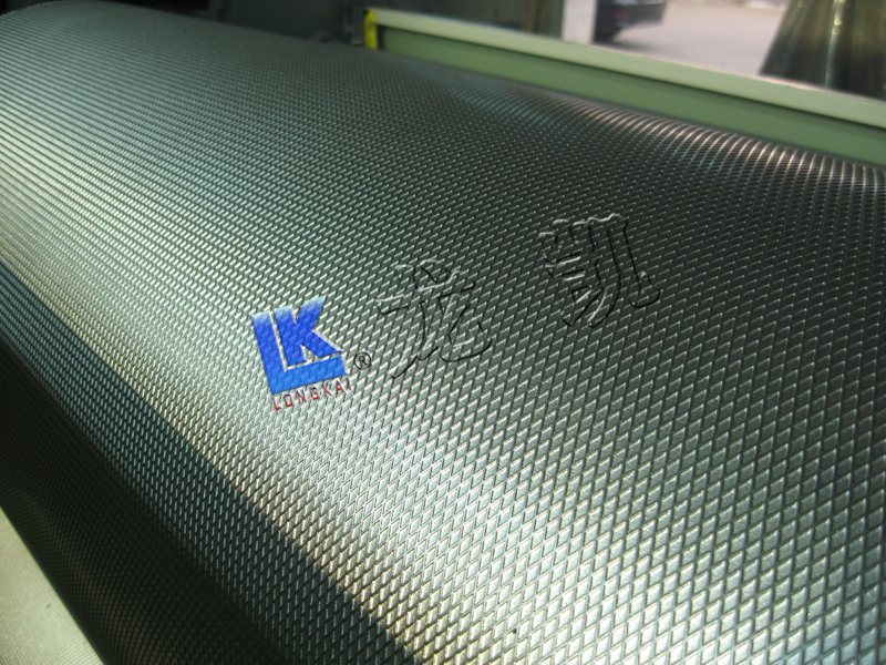 Diamond pattern embossing roll